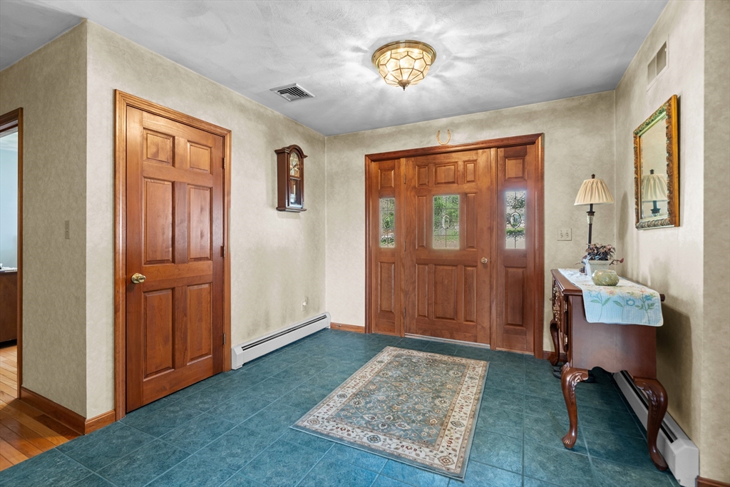36 High Street Freetown, MA 02702 - Photo 9 of 42 a view of an entryway with front door