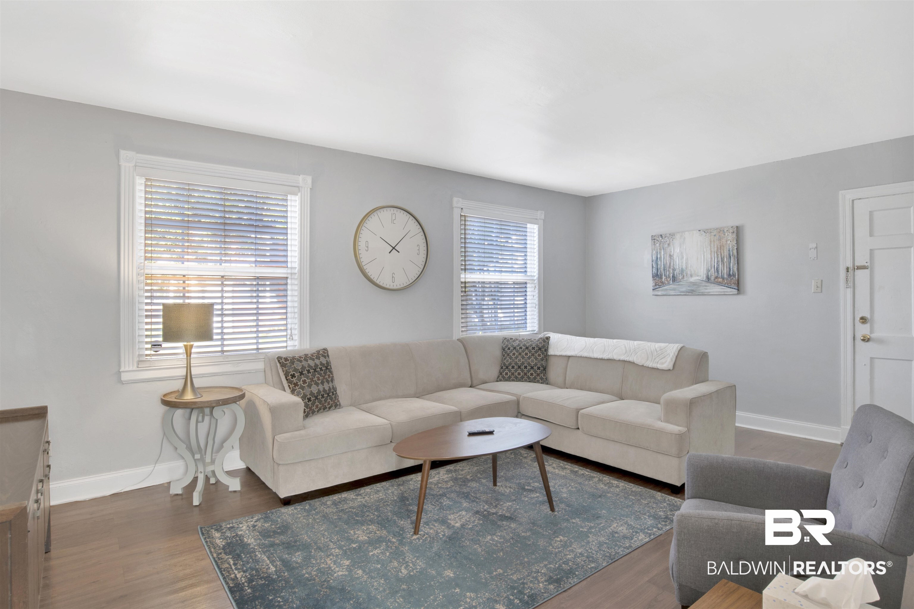 214 Upham Street, Unit 7A Mobile, AL 36607 - Photo 8 of 35 Living room featuring wood finished floors and baseboards