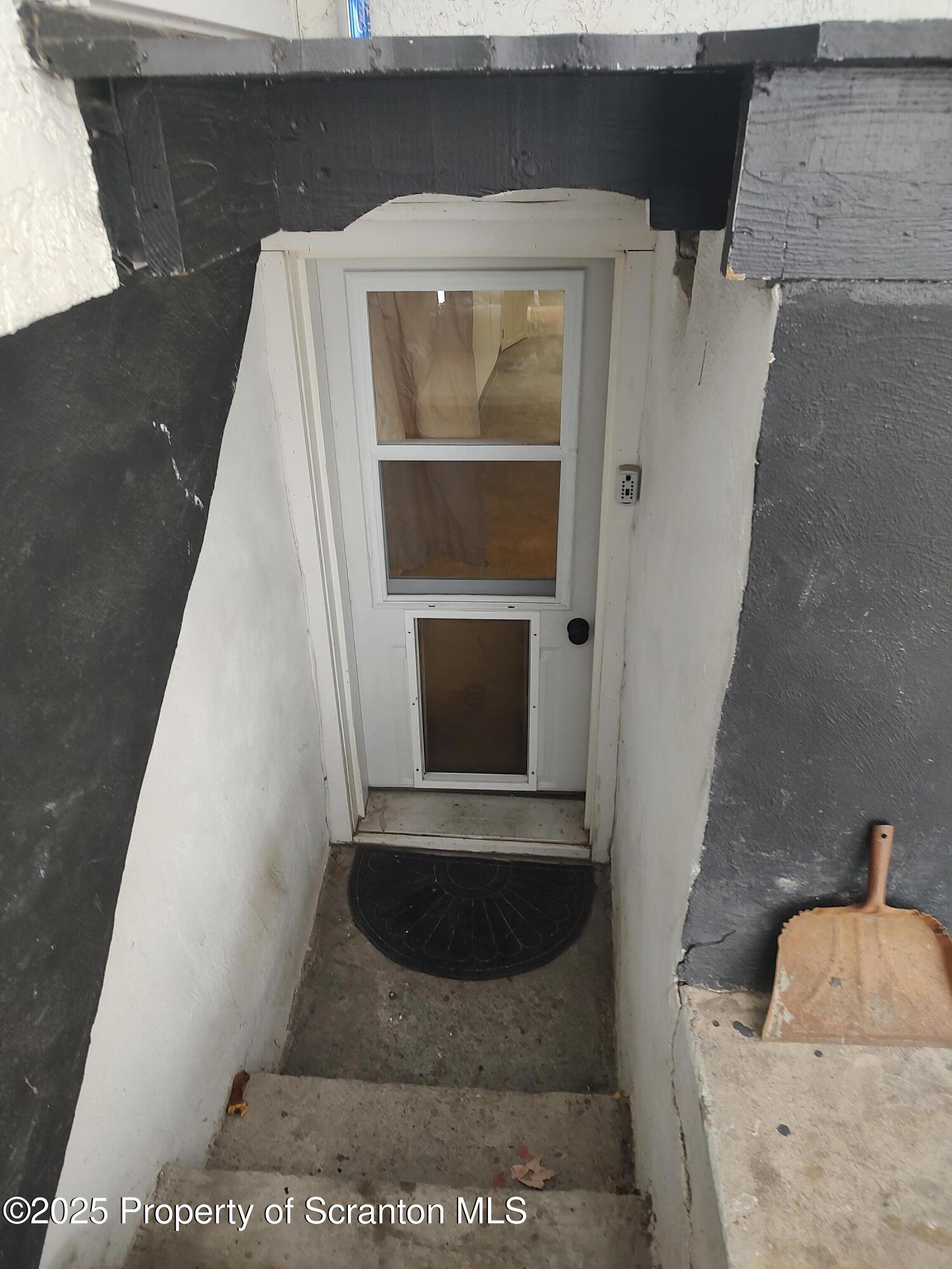 136 Chestnut Street, Unit BSMT Dunmore, PA 18512 - Photo 17 of 22 Entry to Apt From Rear