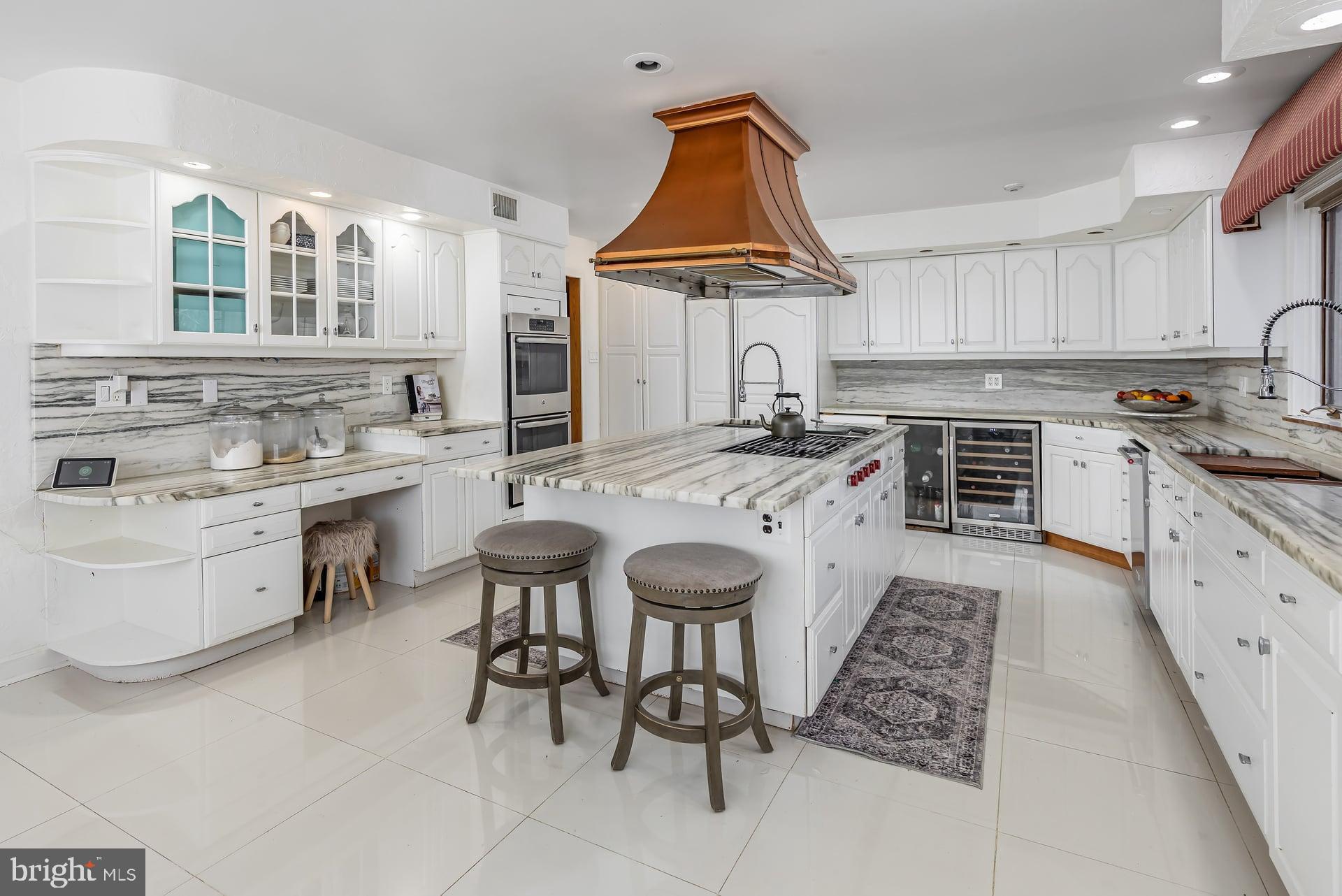 1322 Commissioners Road Mullica Hill, NJ 08062 - Photo 12 of 31 Double ovens, wine fridge