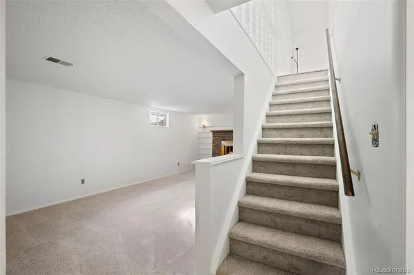 a view of an entryway with staircase