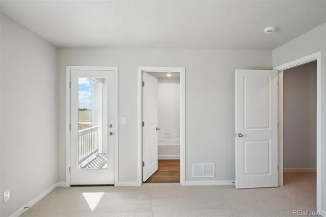a bathroom with a granite countertop sink a bathtub and shower