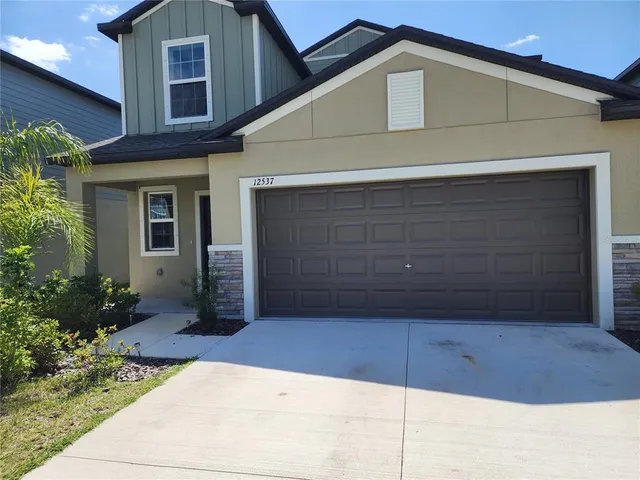 a view of backyard of house