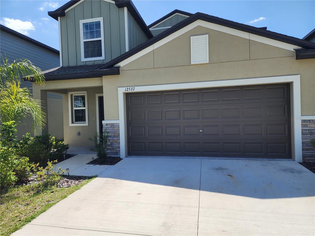 12537 Timber Moss Lane Riverview, FL 33579 - Photo 1 of 16 a view of backyard of house