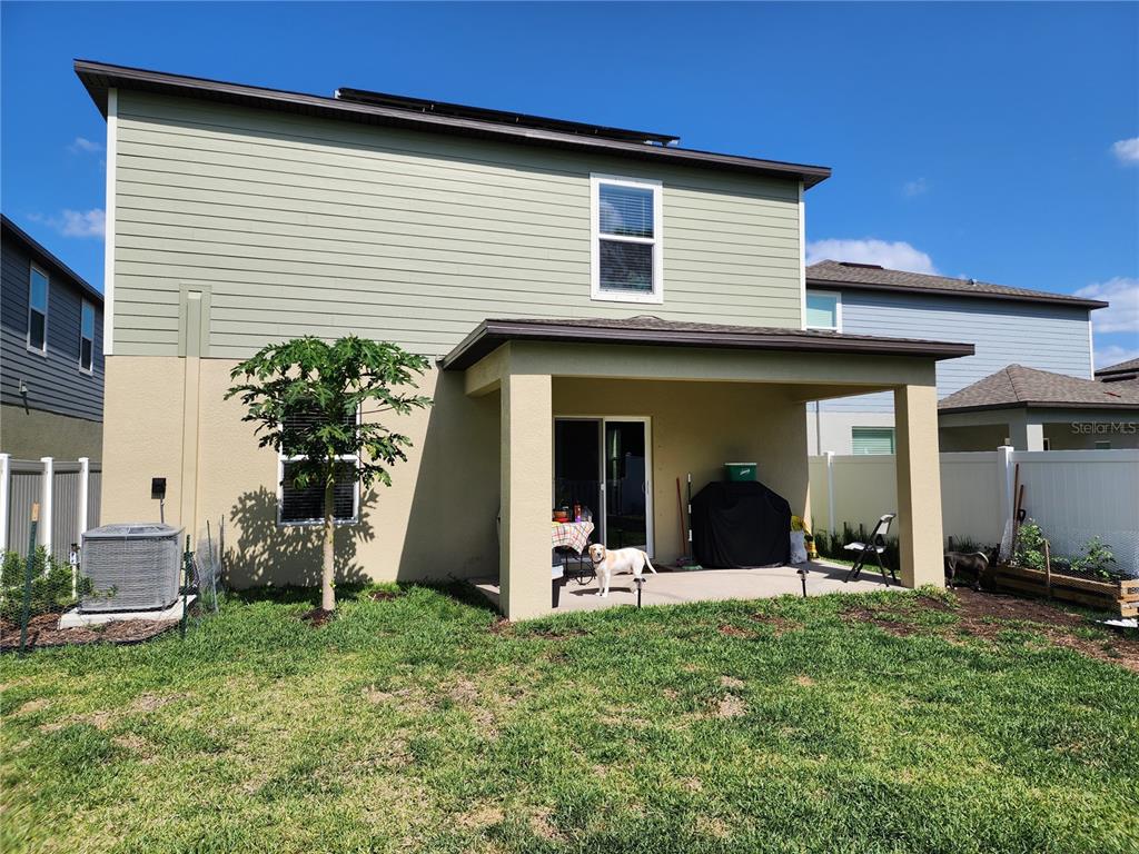 12537 Timber Moss Lane Riverview, FL 33579 - Photo 14 of 16 a view of a house with backyard