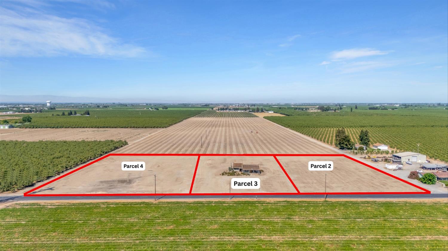 a view of a lake with houses in the back