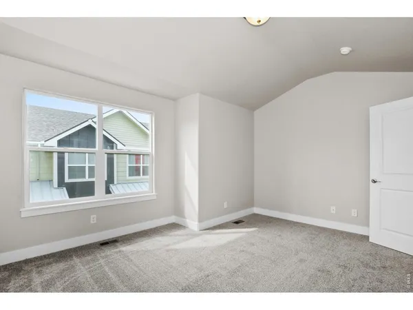 a bathroom with a sink double vanity granite and a mirror