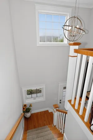 a view of staircase with large window
