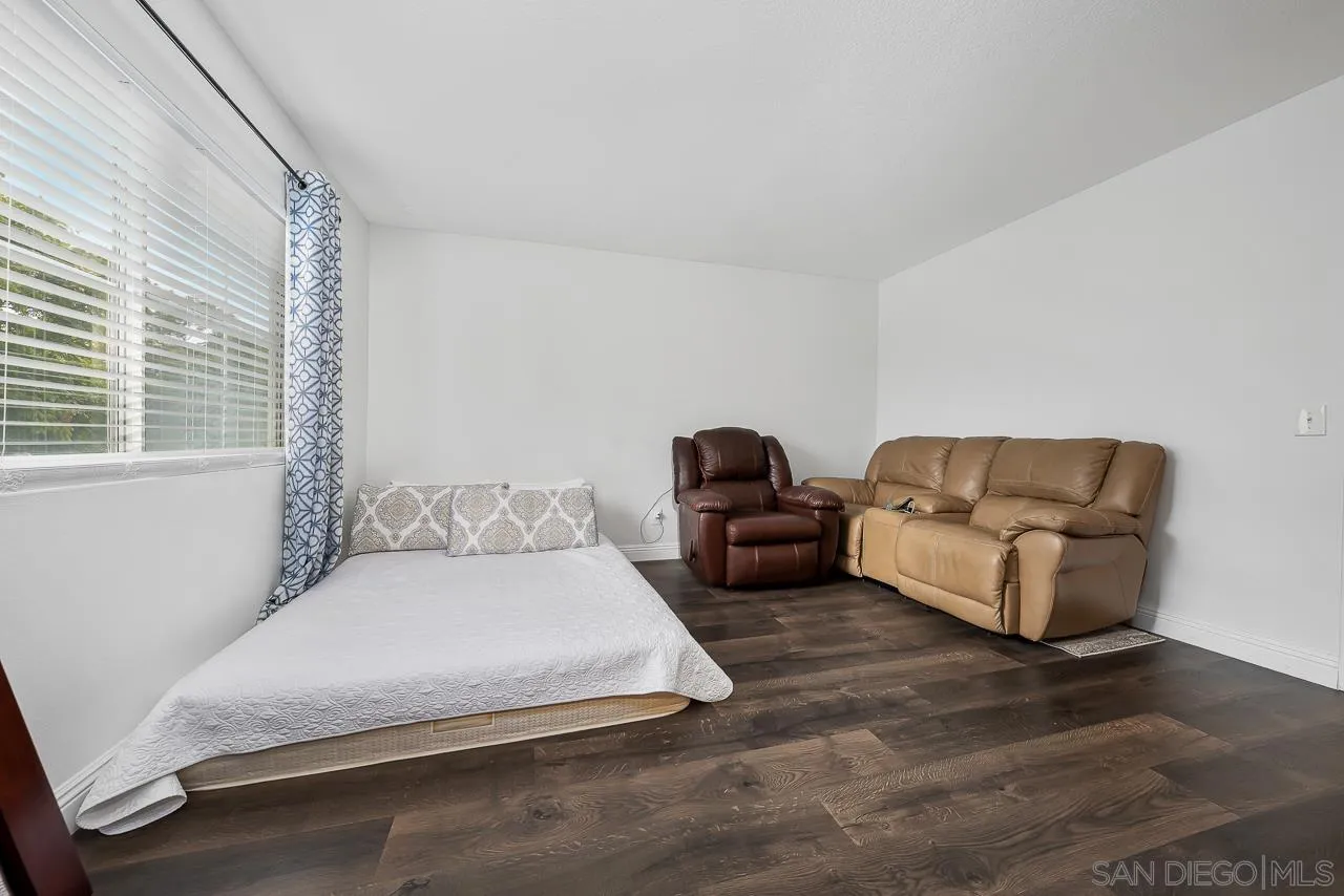 1322 Mill Valley Road Chula Vista, CA 91913 - Photo 14 of 25 a bedroom with a bed and couch