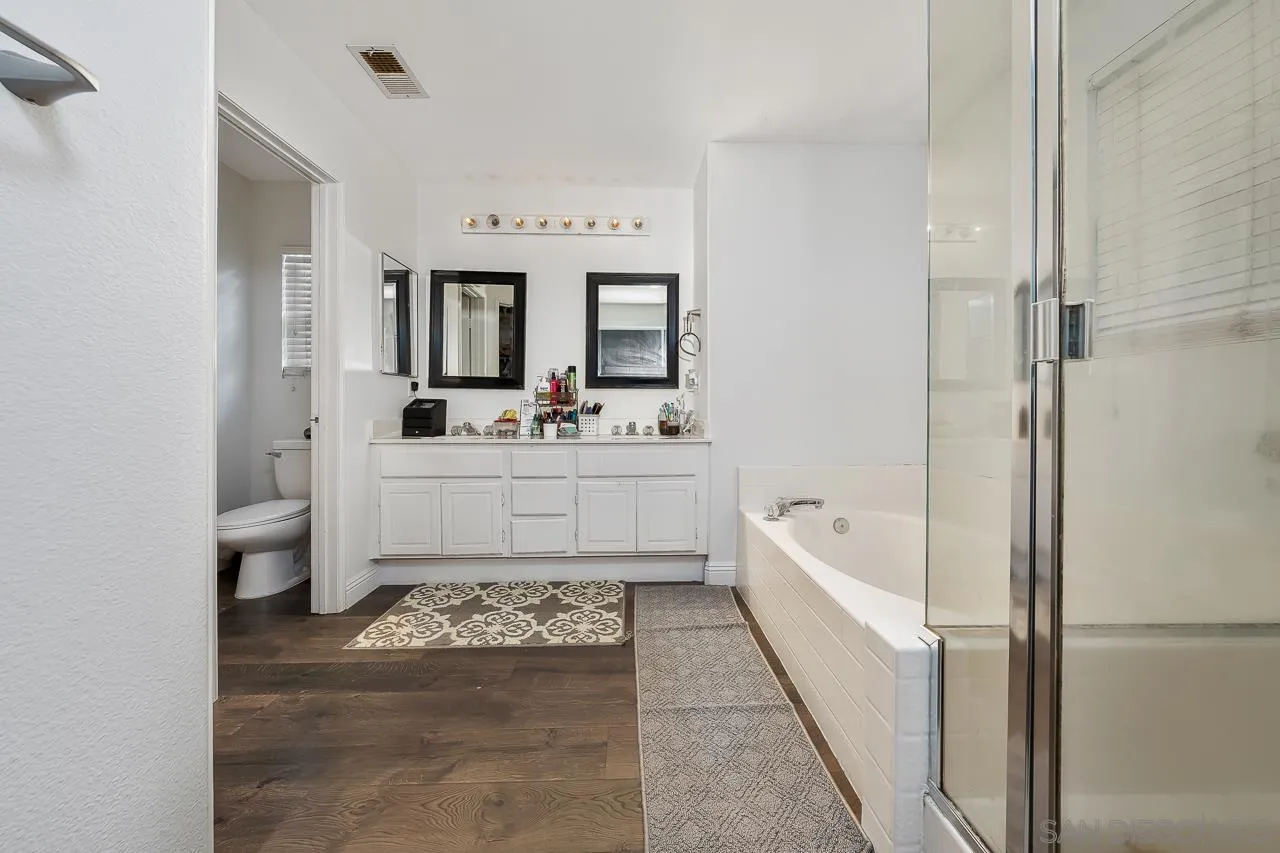 1322 Mill Valley Road Chula Vista, CA 91913 - Photo 15 of 25 a bathroom with a sink a toilet and bathtub