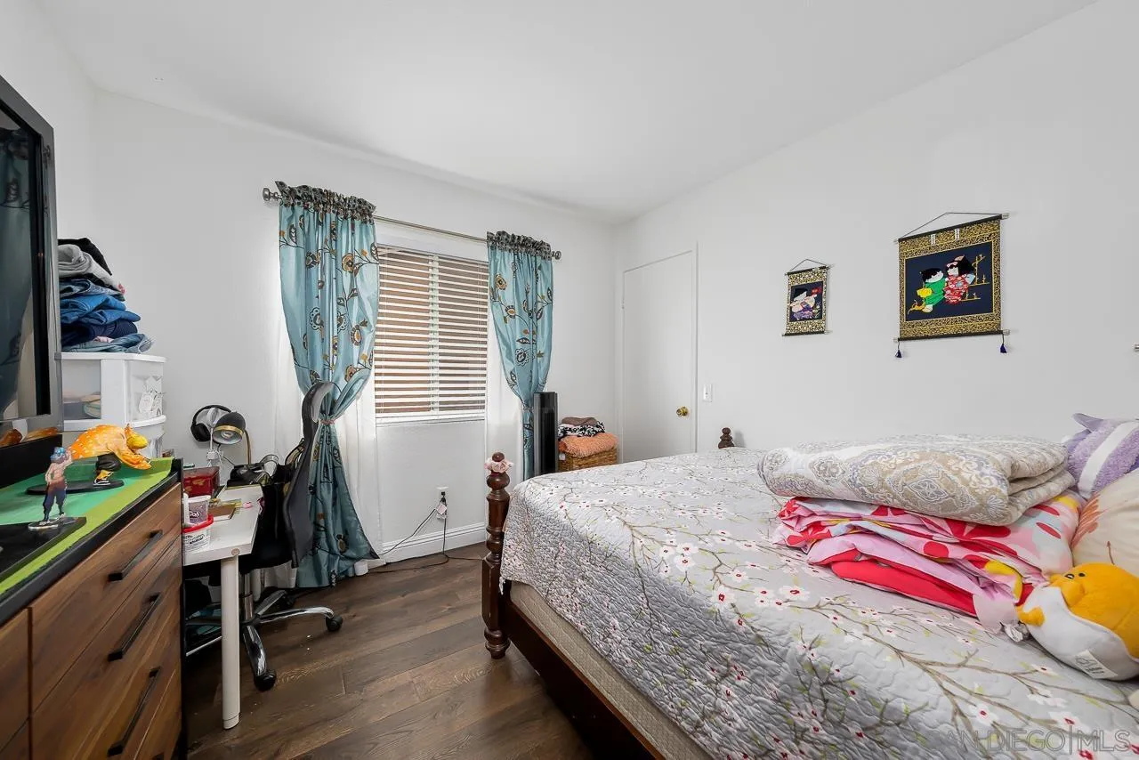 1322 Mill Valley Road Chula Vista, CA 91913 - Photo 18 of 25 a bedroom with a bed and a window