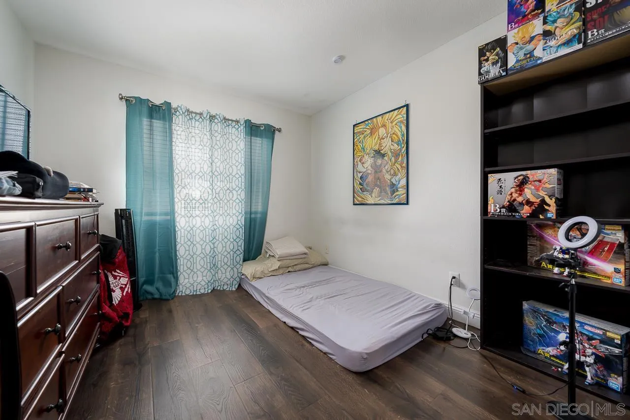 1322 Mill Valley Road Chula Vista, CA 91913 - Photo 22 of 25 a bedroom with furniture and a window