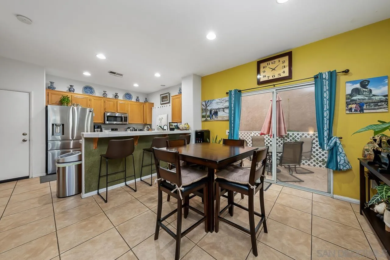 1322 Mill Valley Road Chula Vista, CA 91913 - Photo 7 of 25 a view of a dining room with furniture