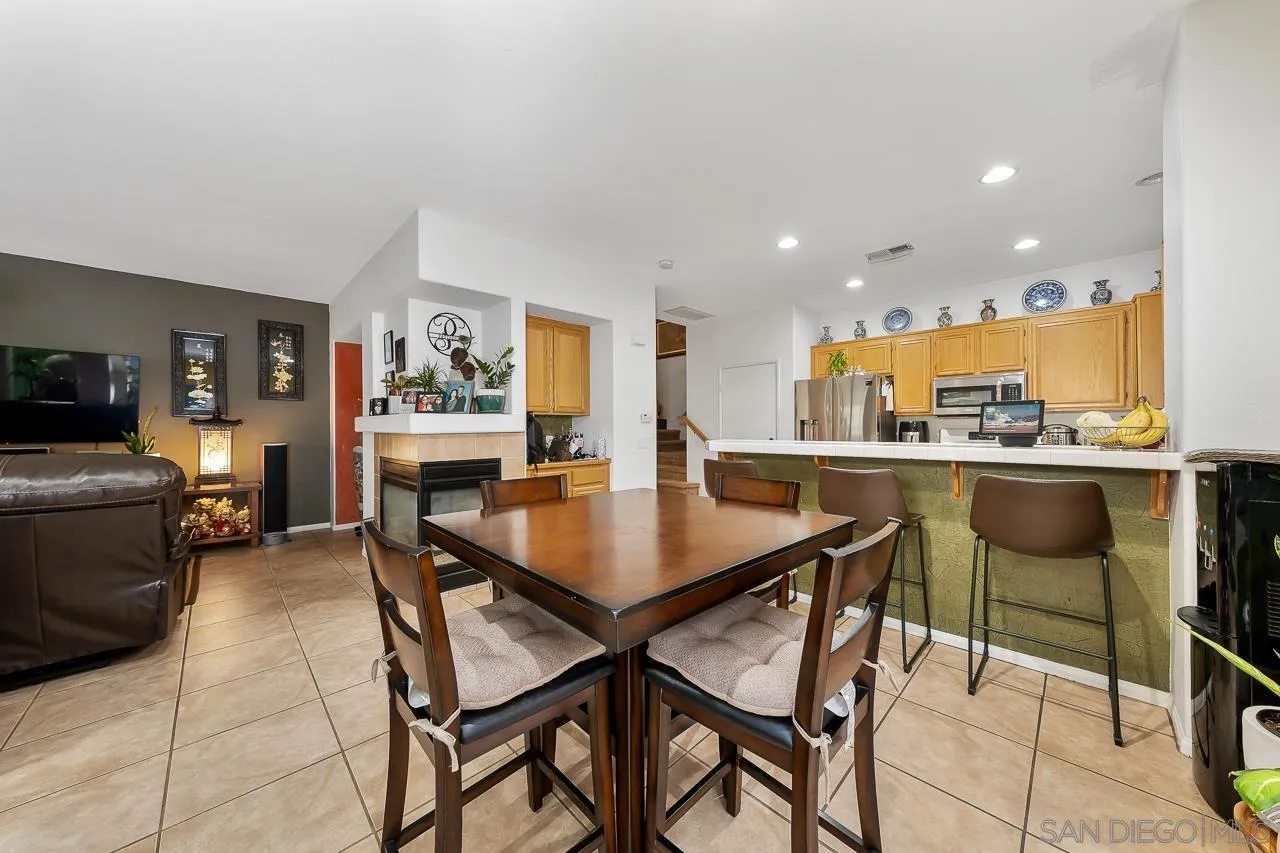 1322 Mill Valley Road Chula Vista, CA 91913 - Photo 8 of 25 a dining room with a table and chairs
