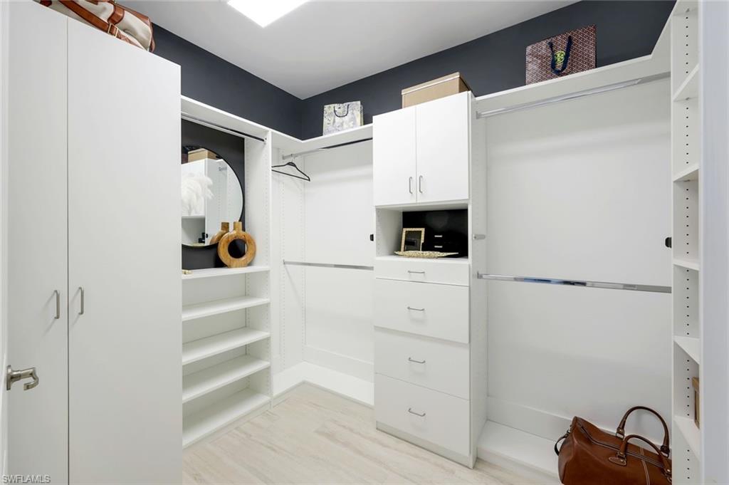 16348 Viansa Way, Unit 101 Naples, FL 34110 - Photo 13 of 34 Custom primary closet