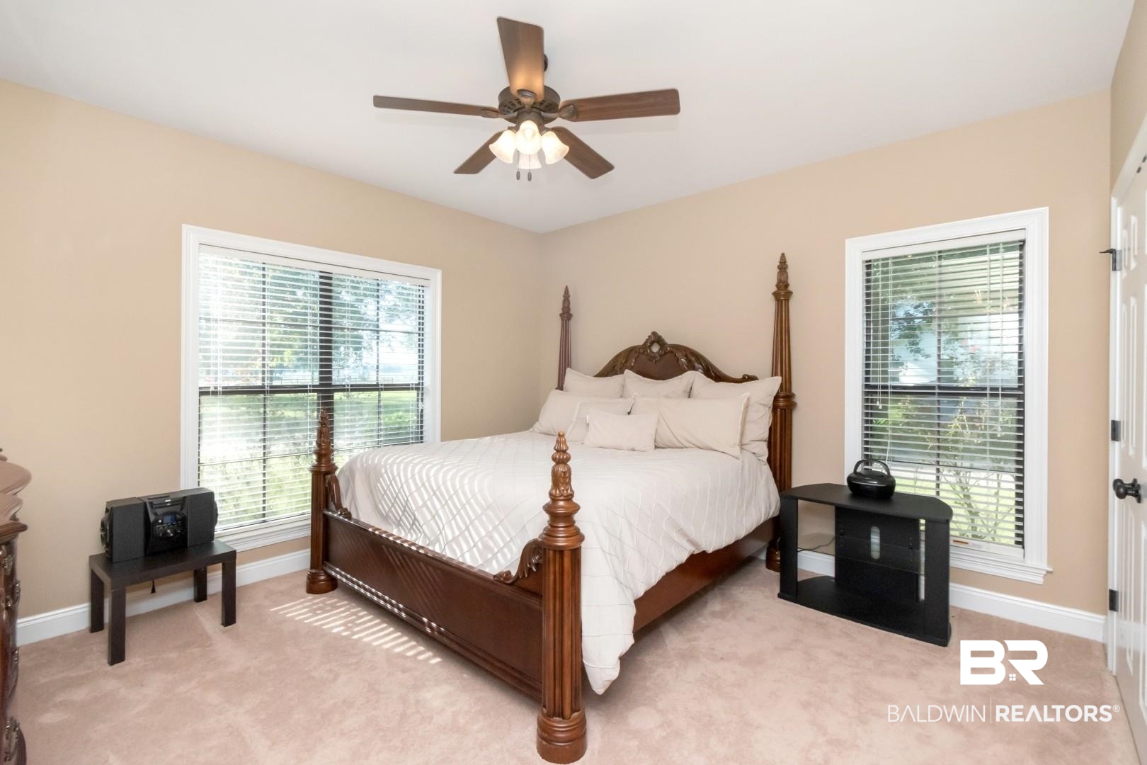 1360 Dykes Road North Mobile, AL 36608 - Photo 21 of 40 Bedroom with light colored carpet and ceiling fan
