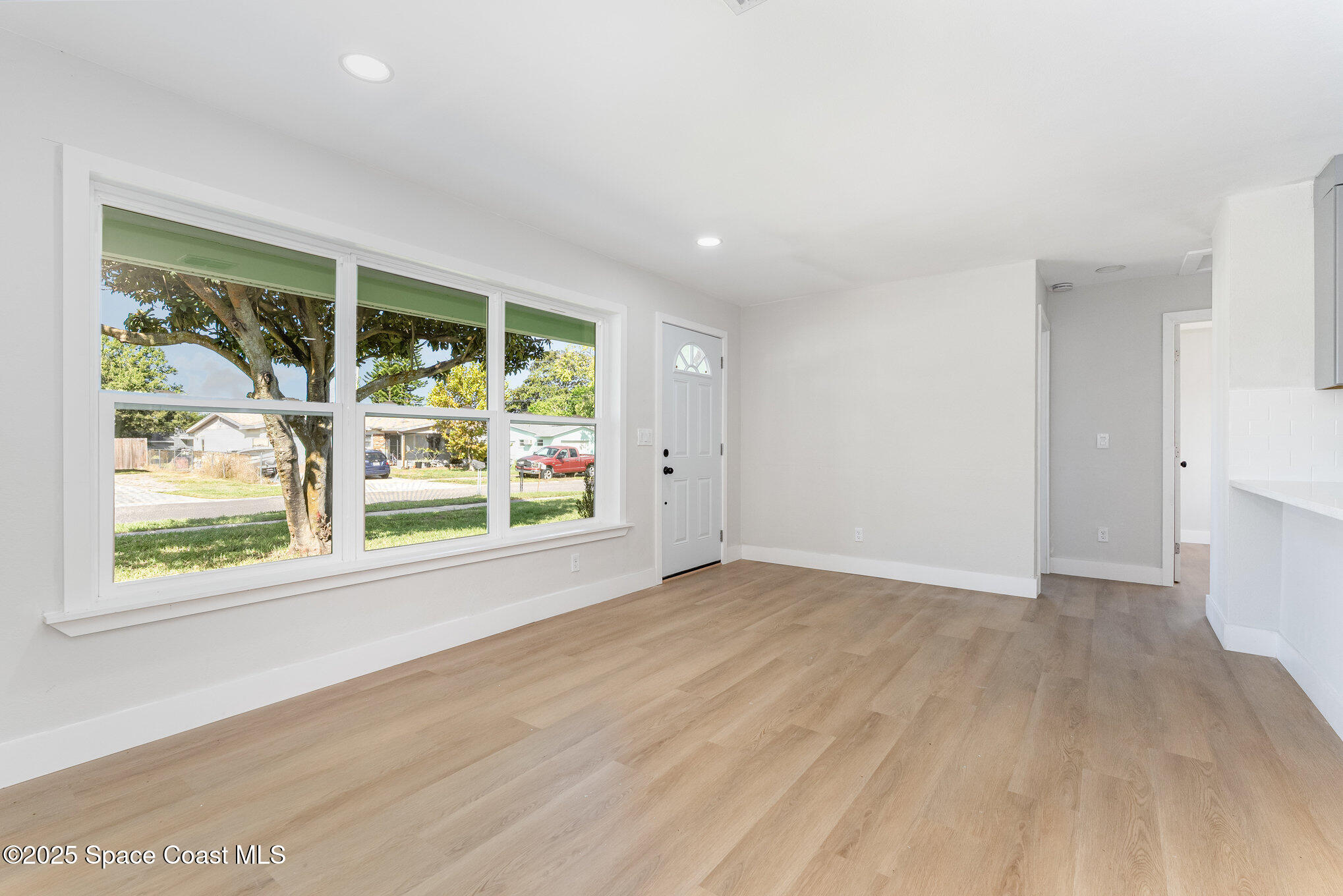 1029 Illinois Road Cocoa, FL 32927 - Photo 5 of 27 a view of an empty room with a window