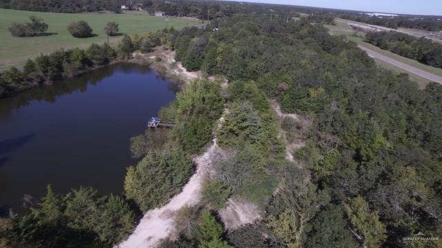 7075 Jones Road Bryan, TX 77807 - Photo 19 of 36 an aerial view of a houses with outdoor space