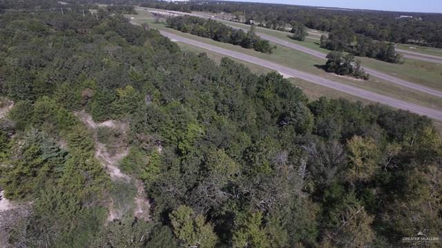 7075 Jones Road Bryan, TX 77807 - Photo 20 of 36 a view of a forest with a street