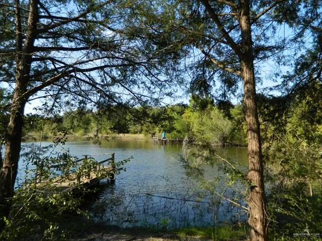 a view of lake with green space