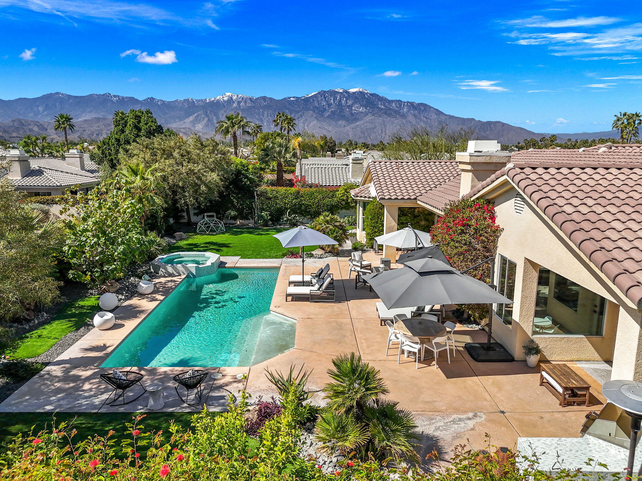 19 Trafagar Square Rancho Mirage, CA 92270 - Photo 2 of 54 a view of a house with a yard and balcony