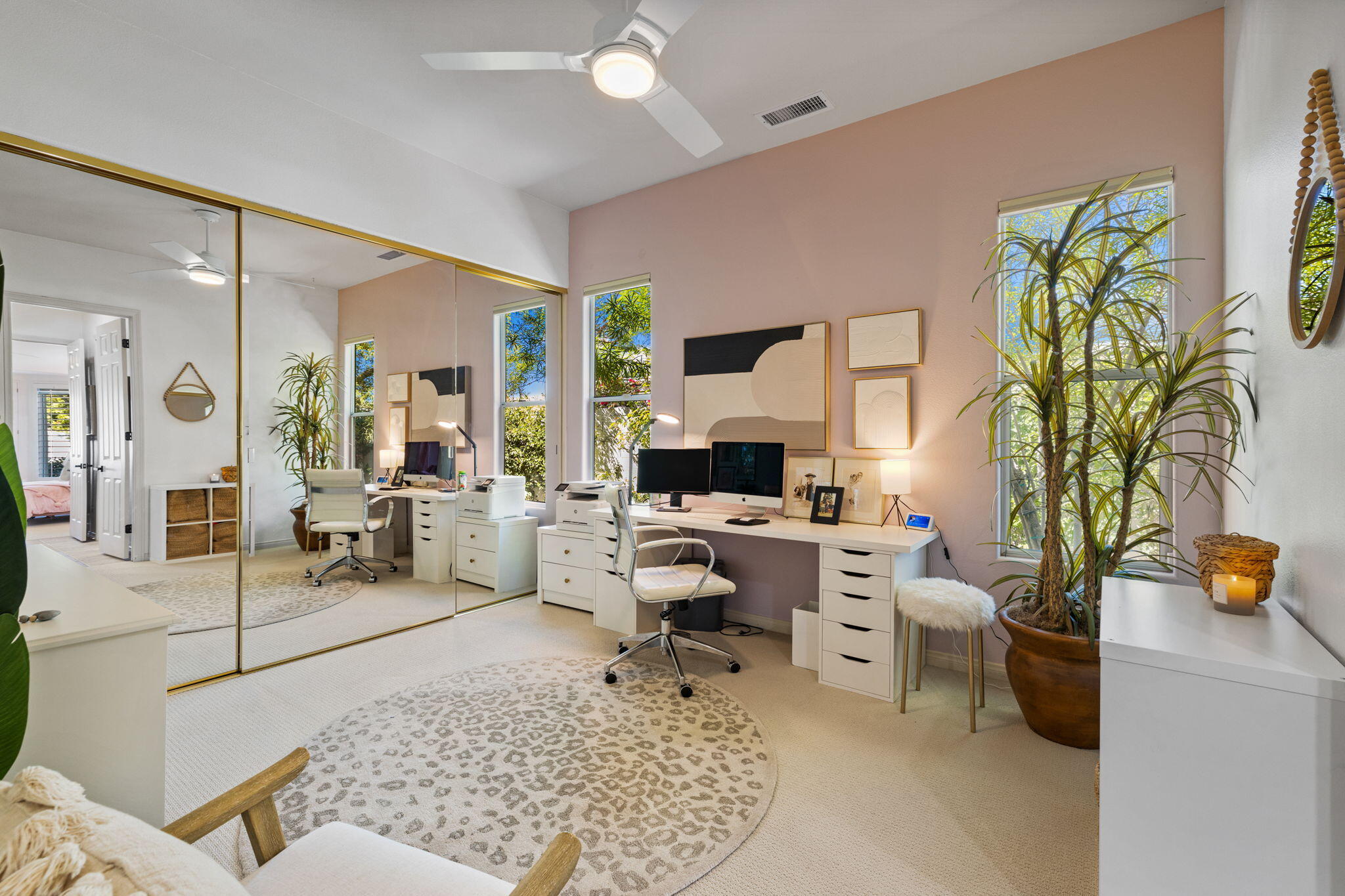 19 Trafagar Square Rancho Mirage, CA 92270 - Photo 23 of 54 a living room with furniture and a potted plant