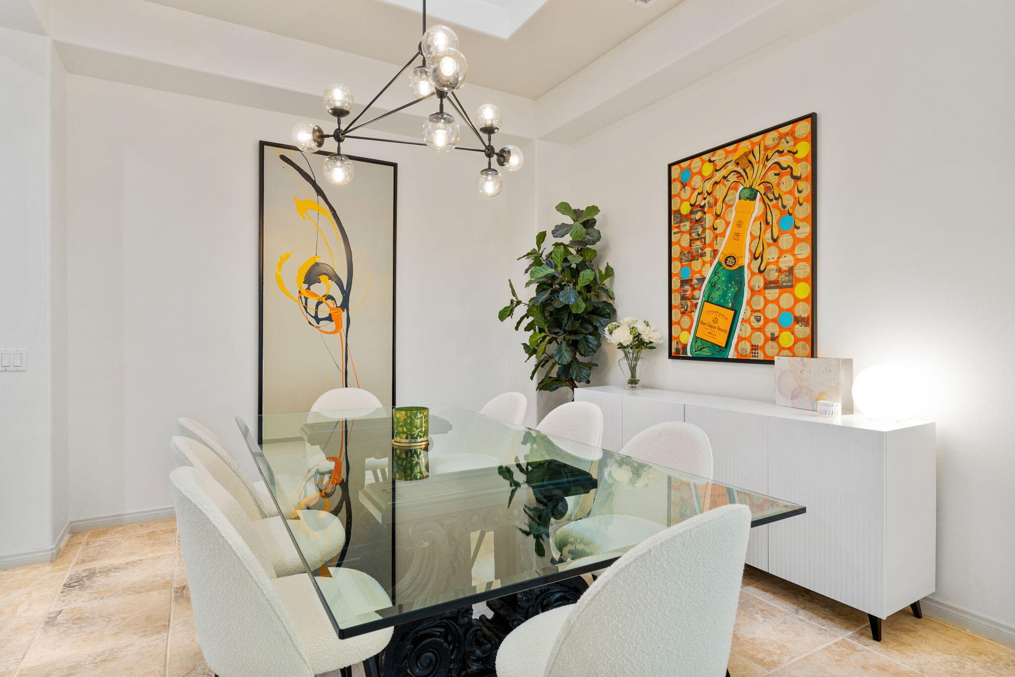 19 Trafagar Square Rancho Mirage, CA 92270 - Photo 32 of 54 a dining room with furniture and a chandelier