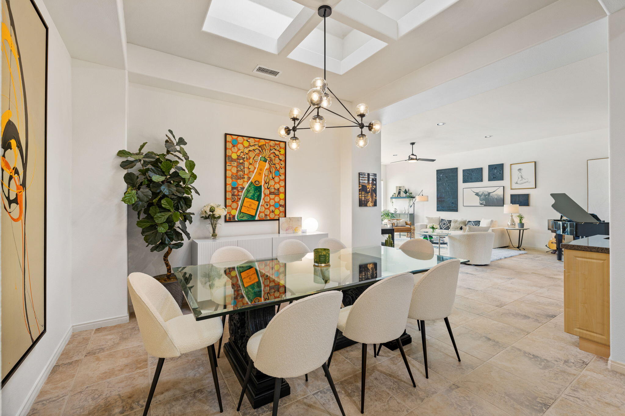 19 Trafagar Square Rancho Mirage, CA 92270 - Photo 33 of 54 a dining room with furniture a chandelier and window