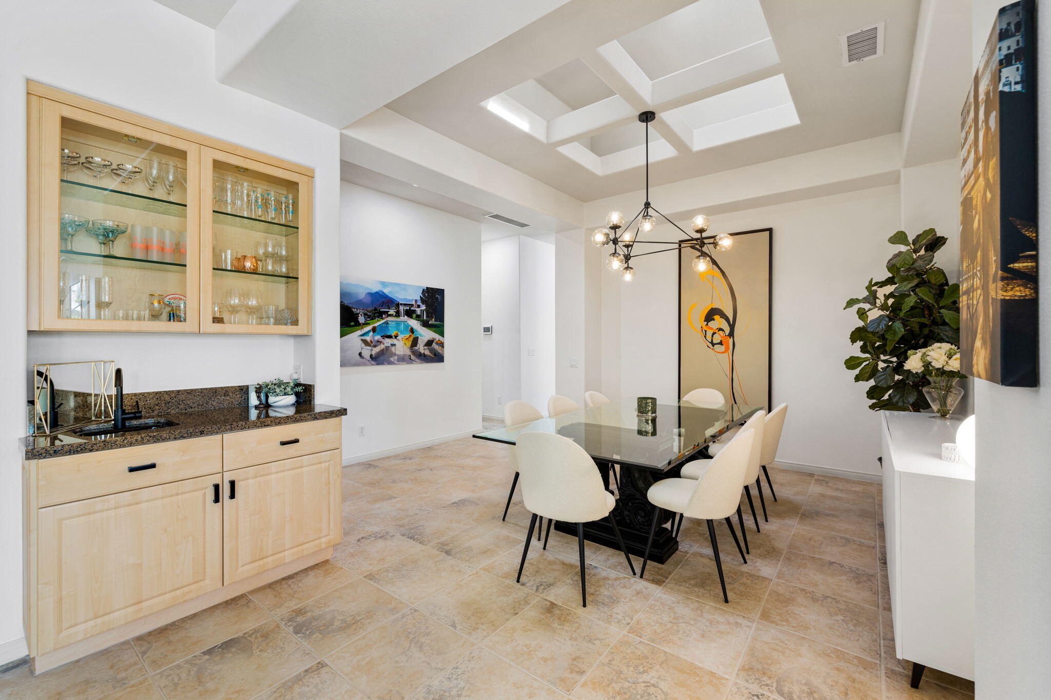 19 Trafagar Square Rancho Mirage, CA 92270 - Photo 34 of 54 a dining room with furniture and window