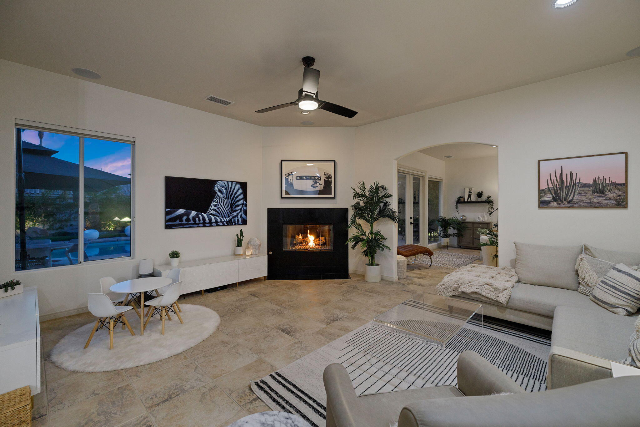 19 Trafagar Square Rancho Mirage, CA 92270 - Photo 54 of 54 a living room with furniture and a fireplace