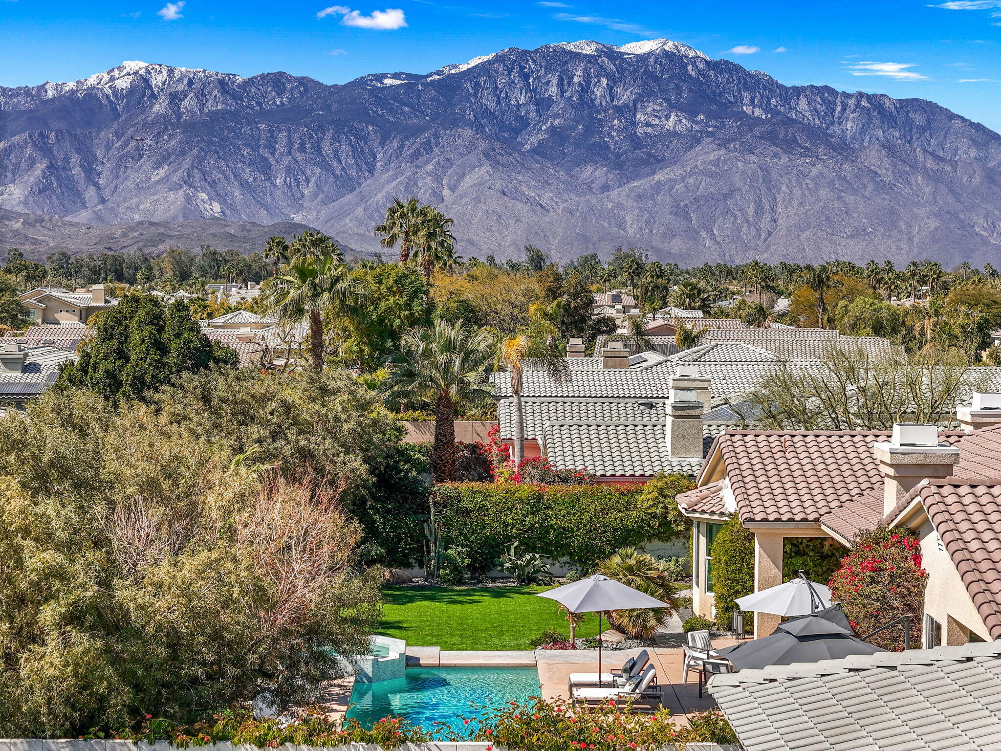 19 Trafagar Square Rancho Mirage, CA 92270 - Photo 8 of 54 a view of a patio with a table and chairs