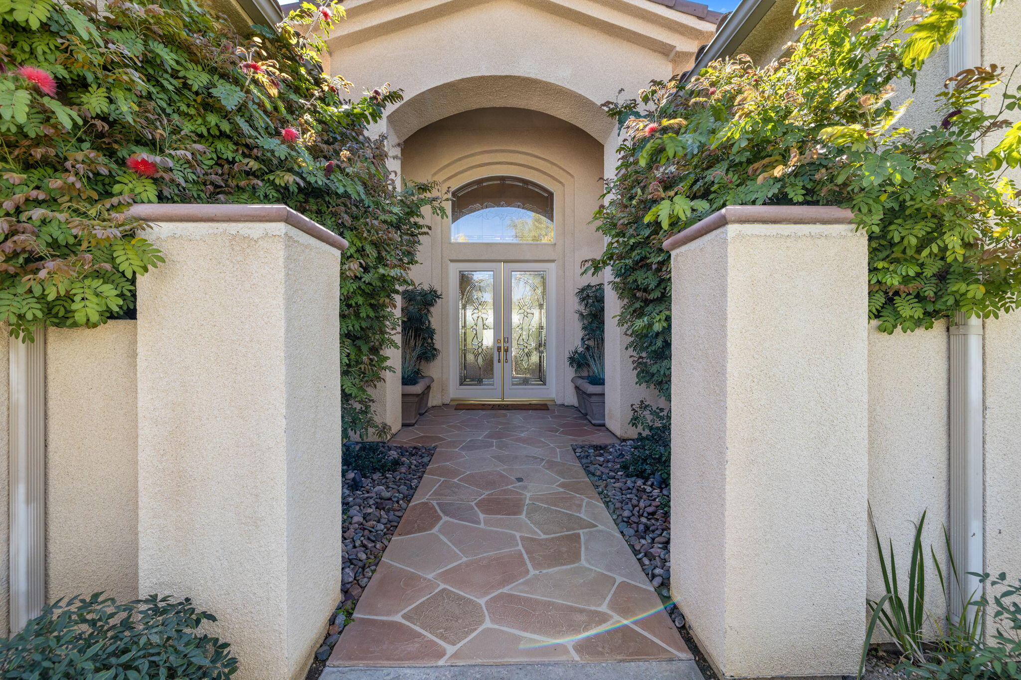 19 Trafagar Square Rancho Mirage, CA 92270 - Photo 9 of 54 a view of a entrance of the house