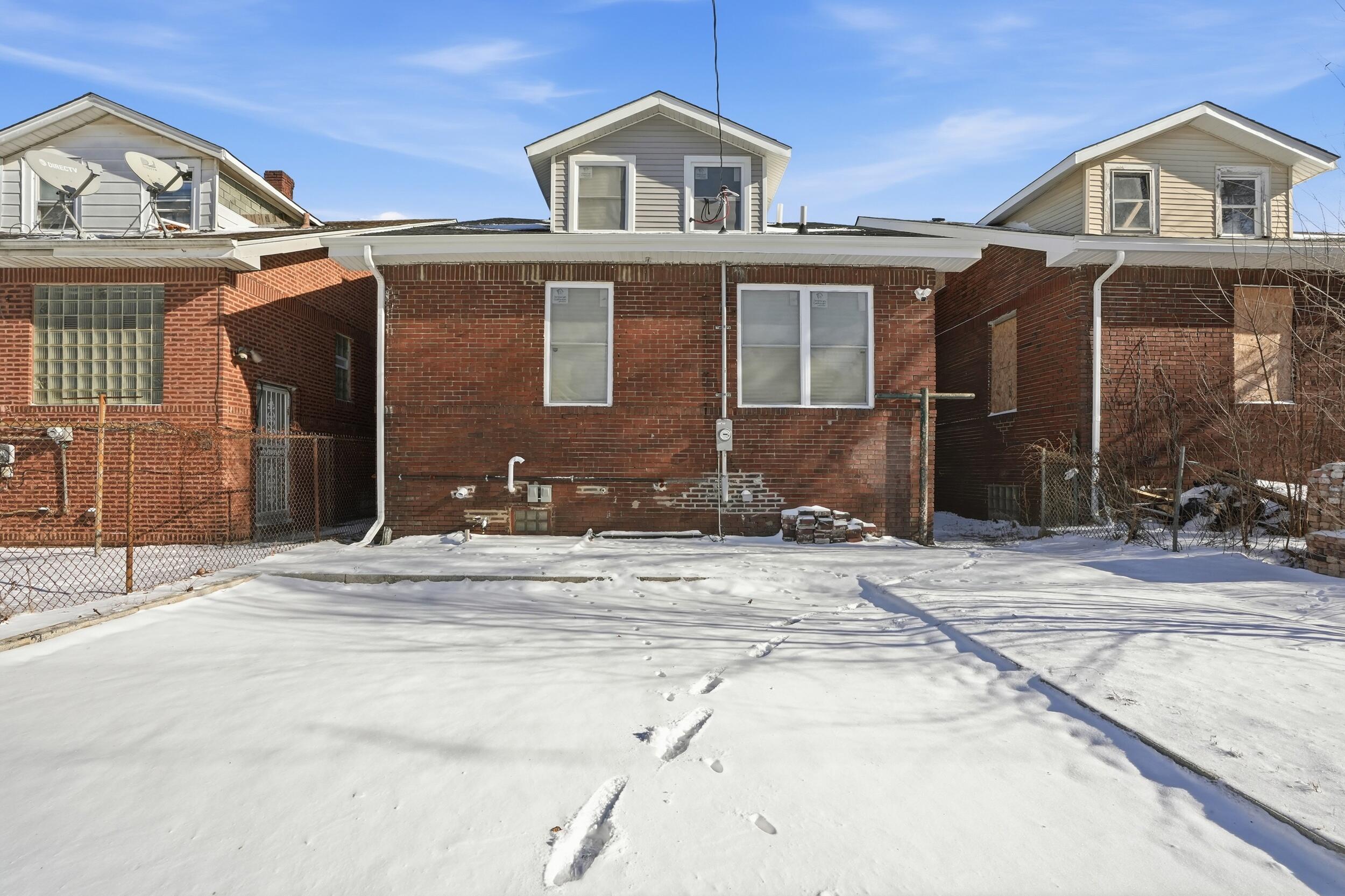 1320 Delaware Street Gary, IN 46407 - Photo 3 of 20 a front view of a house