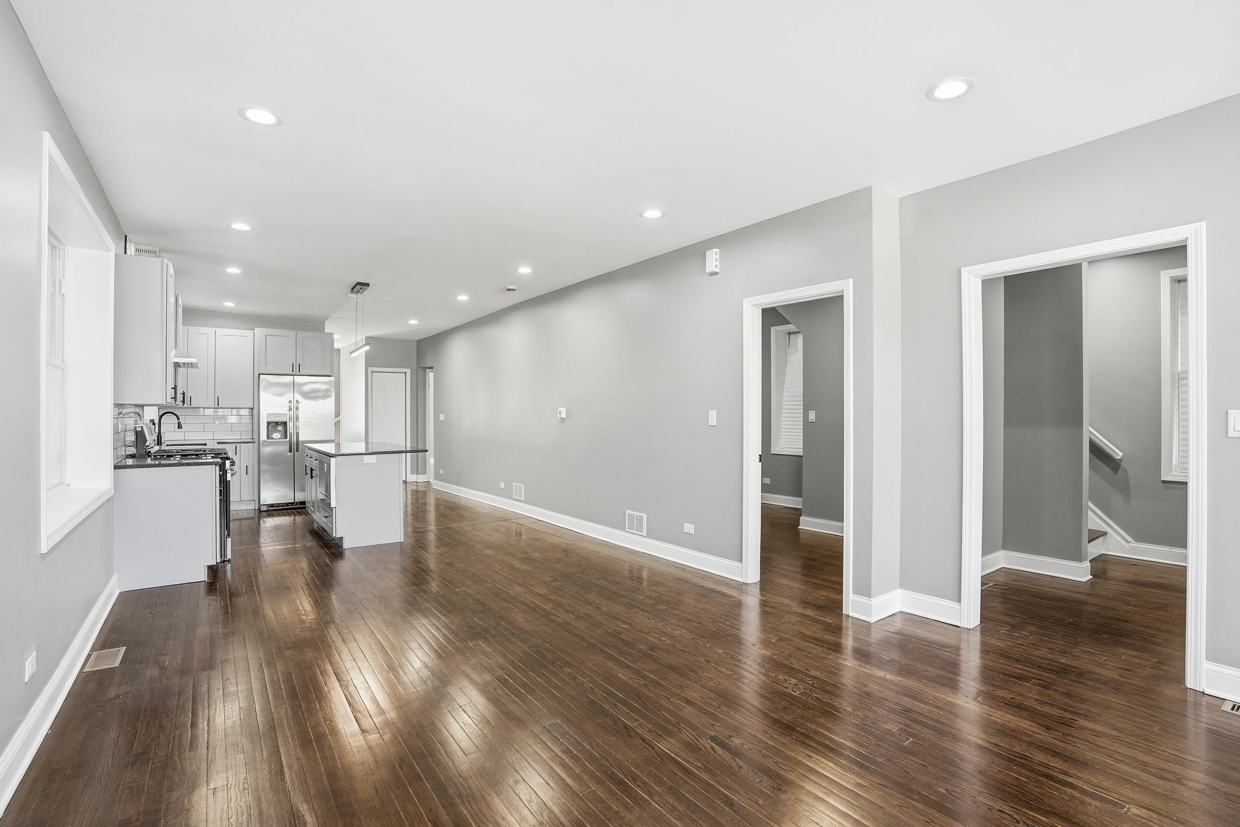 1320 Delaware Street Gary, IN 46407 - Photo 7 of 20 a view of kitchen with furniture and wooden floor