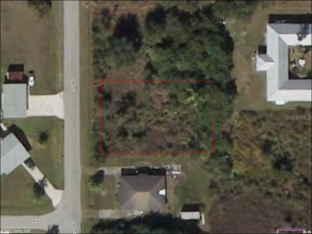 Humkey St Port North Port, FL 34291 - Photo 1 of 1 an aerial view of a house with a yard