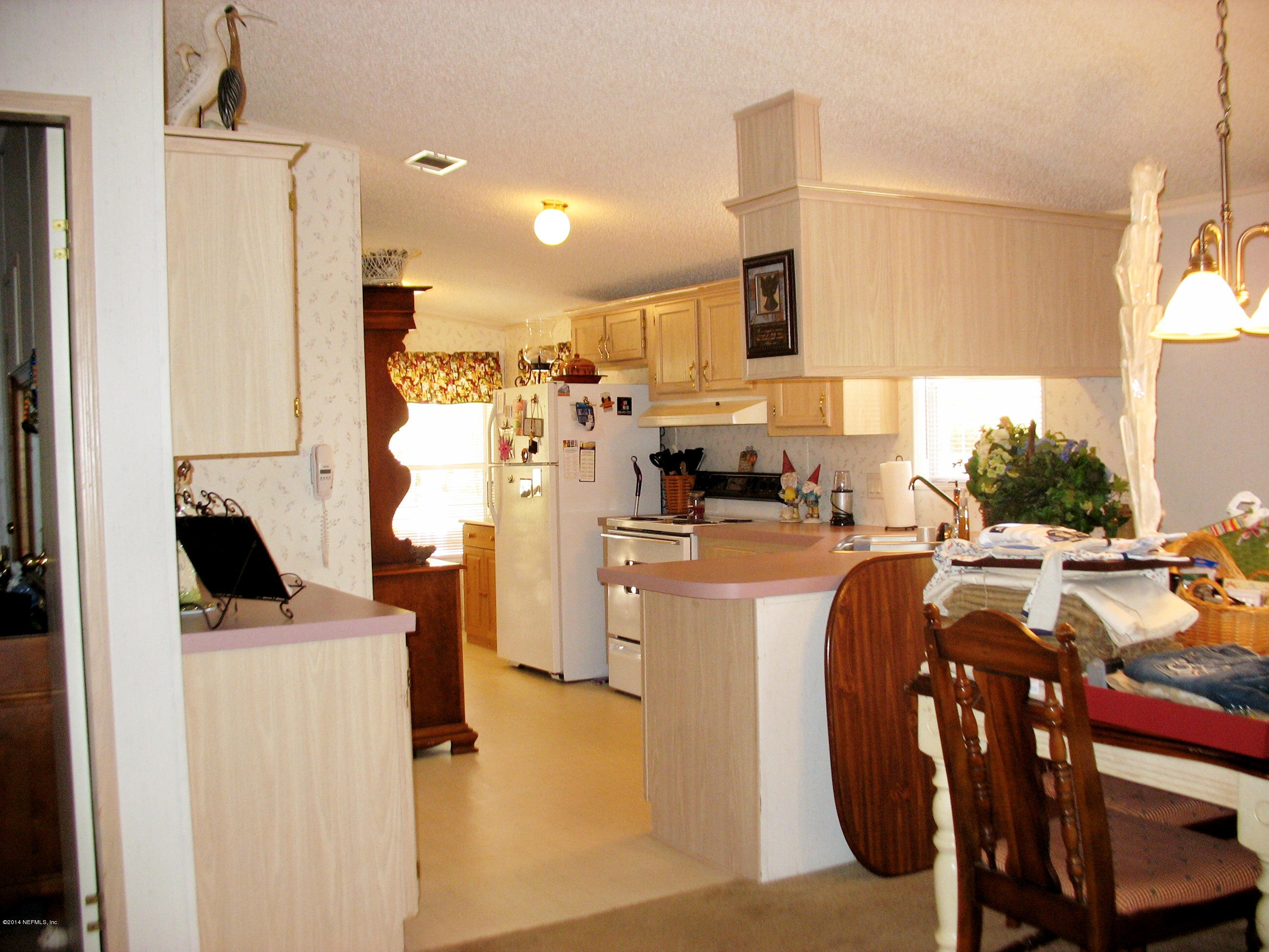 85163 Miner Road Yulee, FL 32097 - Photo 19 of 43 Dining/Living View to Kitchen