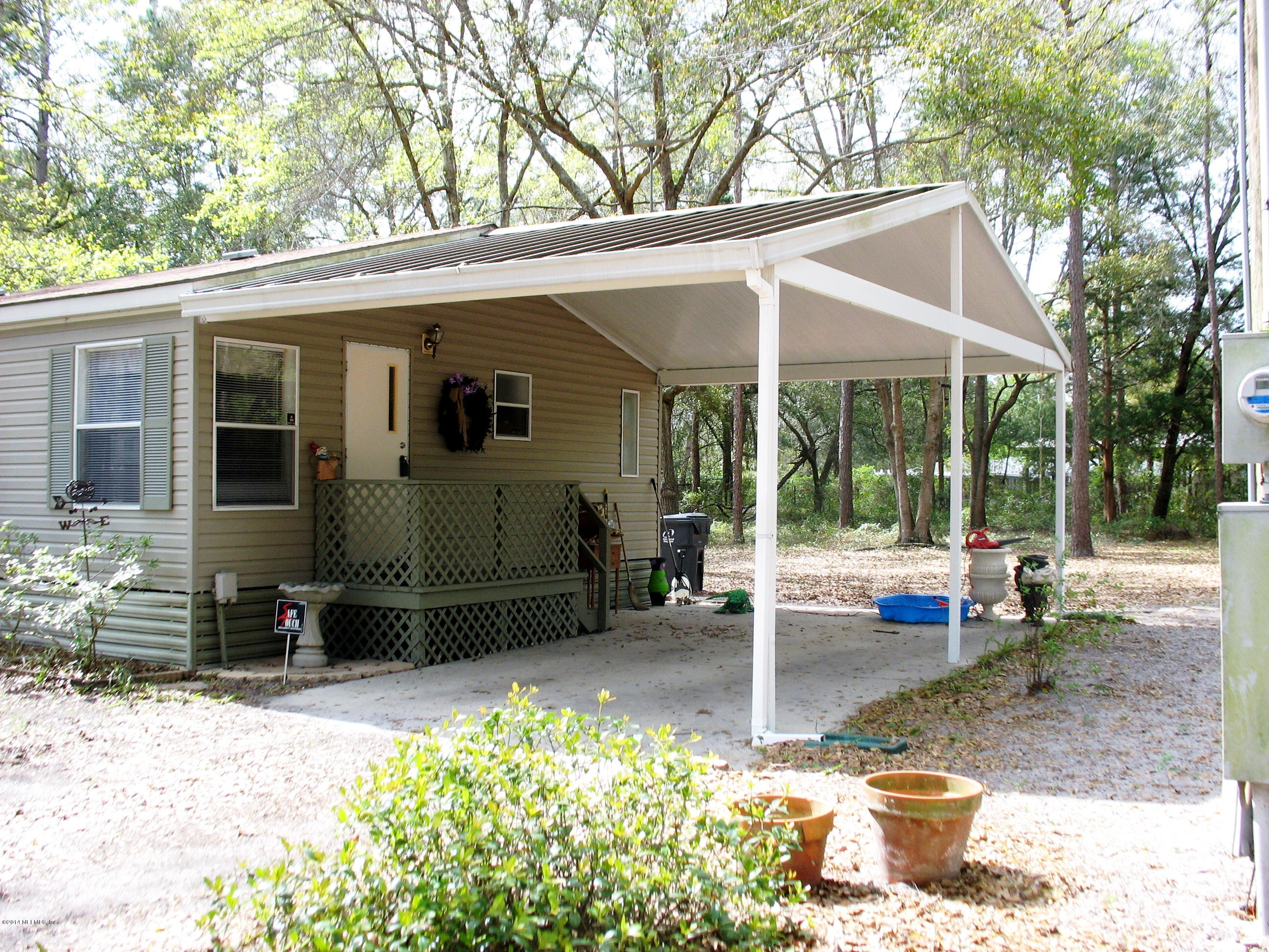 85163 Miner Road Yulee, FL 32097 - Photo 32 of 43 Oversized carport & extra parking nearby