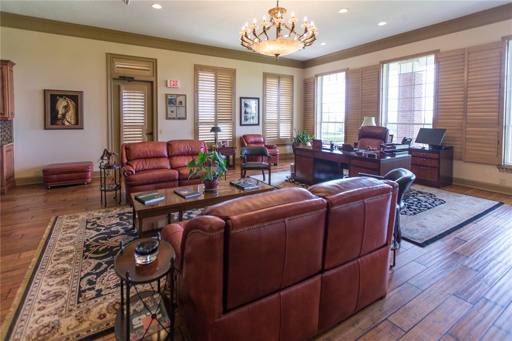 6800 Northwest 193rd Street Reddick, FL 32686 - Photo 15 of 65 a living room with furniture or couch and a large window