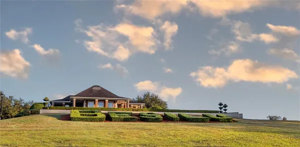 a view of a lake with a yard
