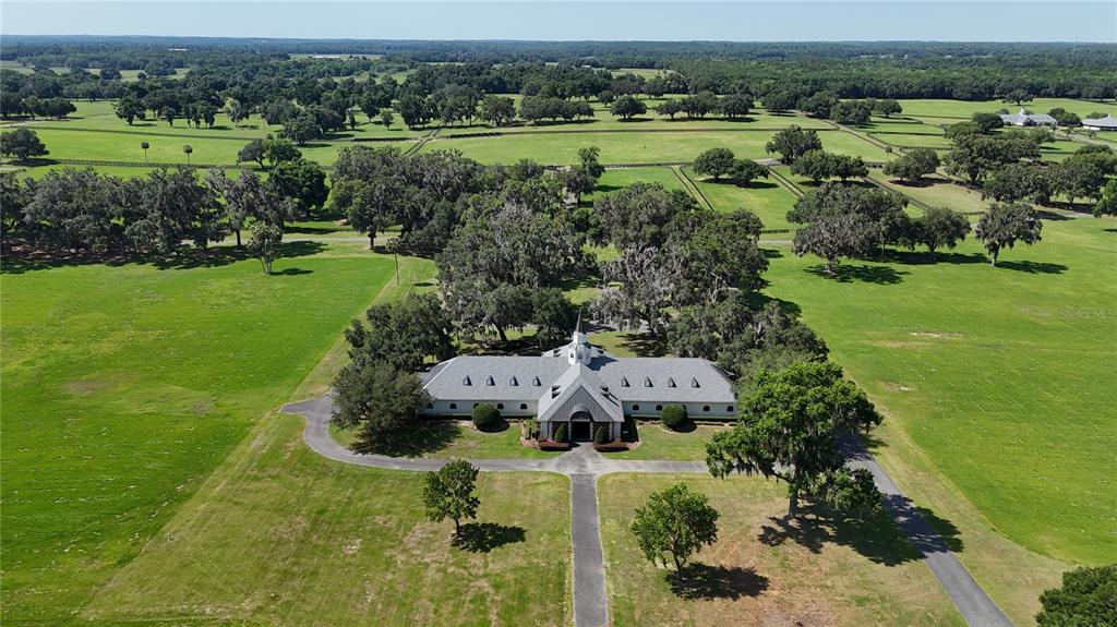 6800 Northwest 193rd Street Reddick, FL 32686 - Photo 26 of 65 a view of a garden with a lake