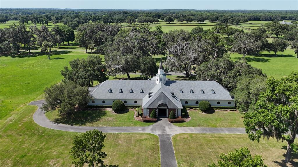 6800 Northwest 193rd Street Reddick, FL 32686 - Photo 27 of 65 an aerial view of a house with outdoor space lake view and mountain view