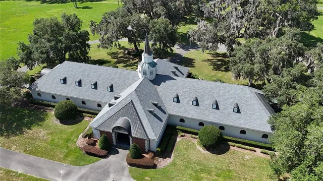 a view of swimming pool with an outdoor space and seating area