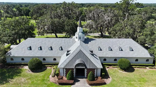 a view of a lake with houses in the background
