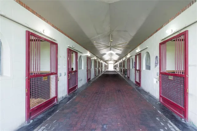 an aerial view of a houses with a outdoor space
