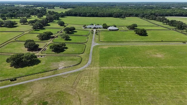 a view of a lake with a yard