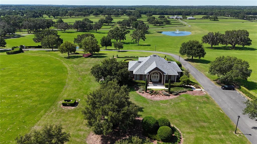 6800 Northwest 193rd Street Reddick, FL 32686 - Photo 5 of 65 an aerial view of a house with a yard lake view and mountain view