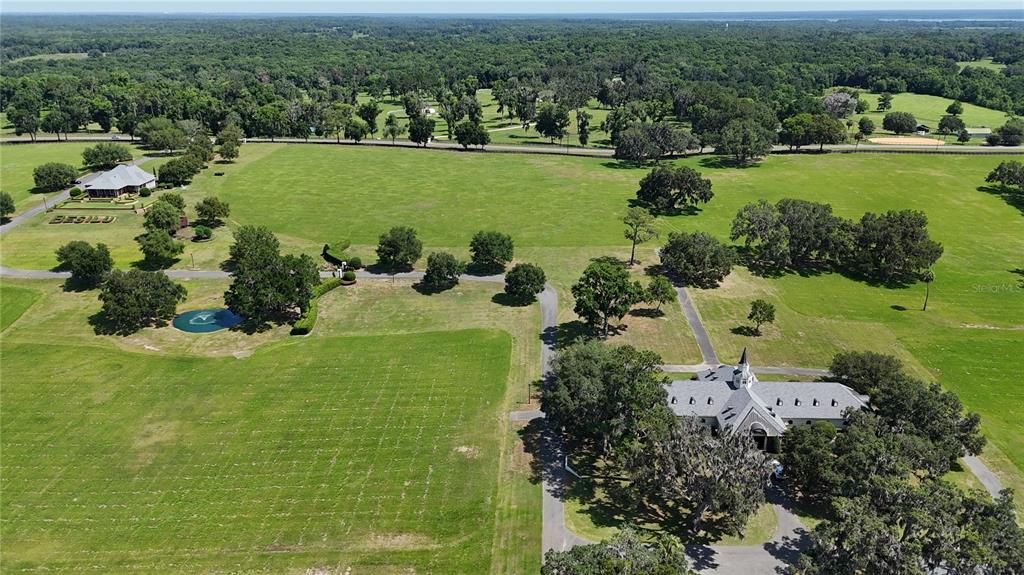 6800 Northwest 193rd Street Reddick, FL 32686 - Photo 64 of 65 an aerial view of a houses with a lake view