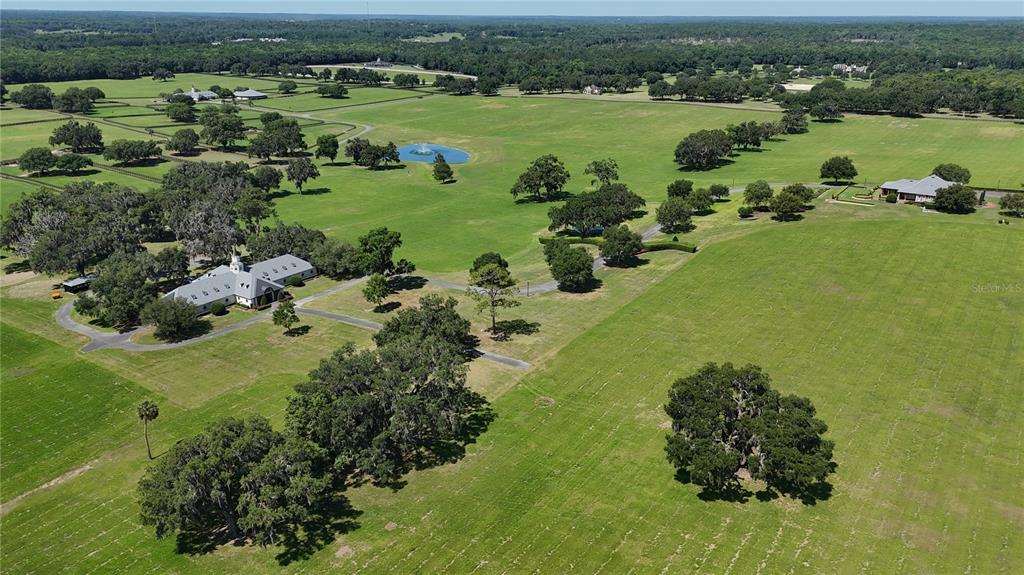 6800 Northwest 193rd Street Reddick, FL 32686 - Photo 65 of 65 a view of a lake with houses
