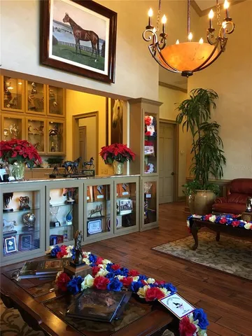 a living room with furniture or couch and a large window