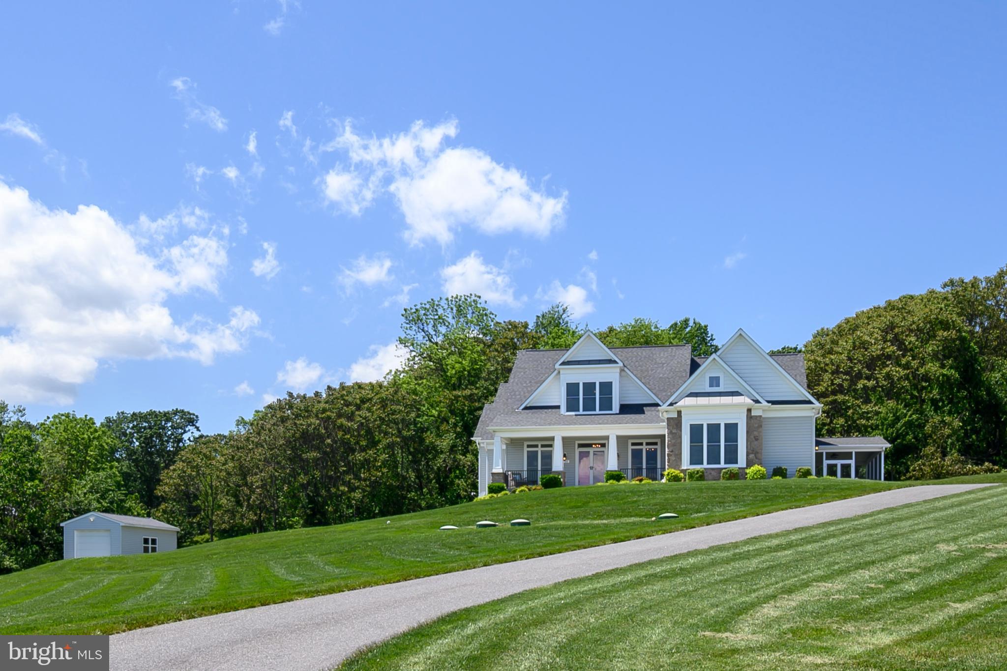 1760 Florence Road Mount Airy, MD 21771 - Photo 3 of 63 a front view of a house with a yard